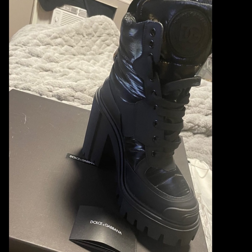 Brand dolce&gabana boots , new never worn in box,Size 38 runsmall fits like a 37